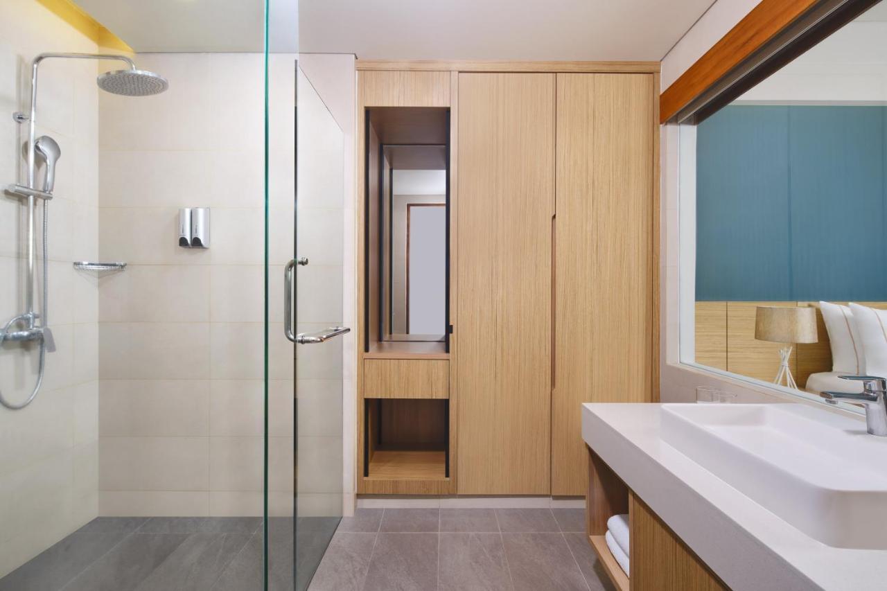 Deluxe Twin Room with Pool Access - Garden Level with  Free Mini Bar, Daily Shuttle to Monkey Forest, Daily Yoga, Free Bike to borrow,  Free Family Activity and 24 Hour access to Motion Fitness Center.
