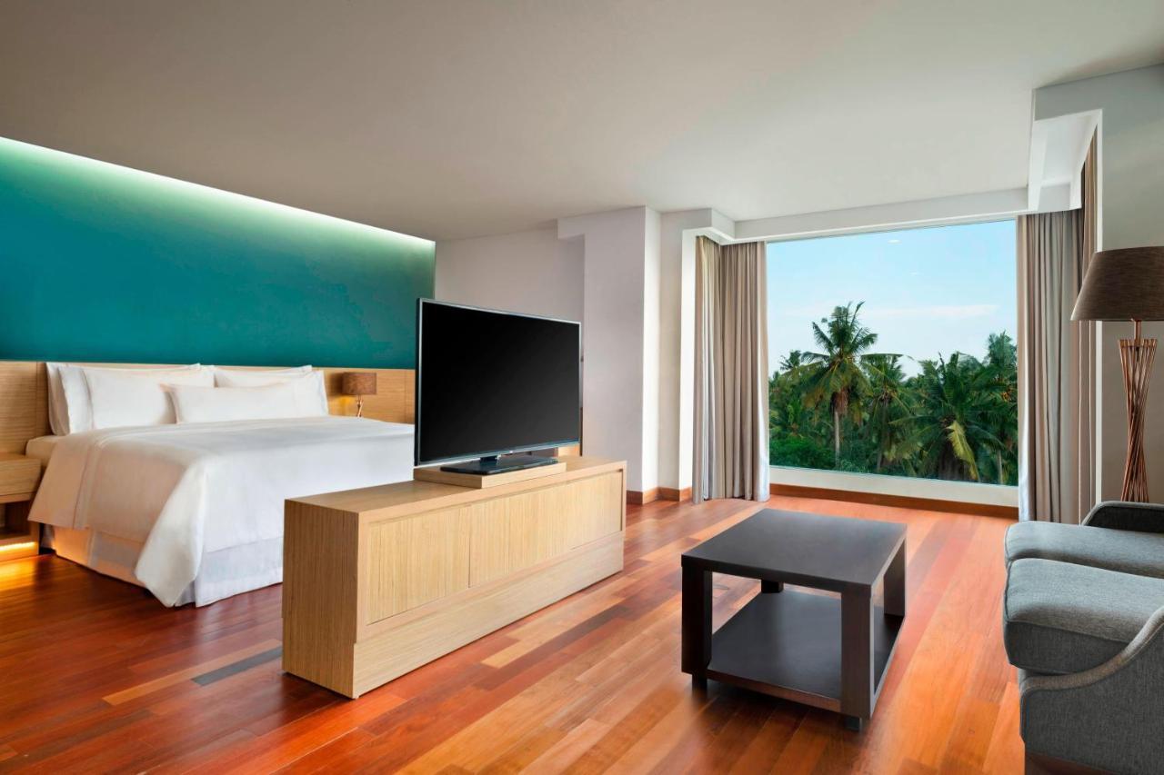 Punyan Suite Room, 1 Bedroom Suite, 1 King, Garden view, Balcony with Free Mini Bar, Daily Shuttle to Monkey Forest, Daily Yoga, Free Bike to borrow,  Free Family Activity and 24 Hour access to Motion Fitness Center,758819371:JPEG